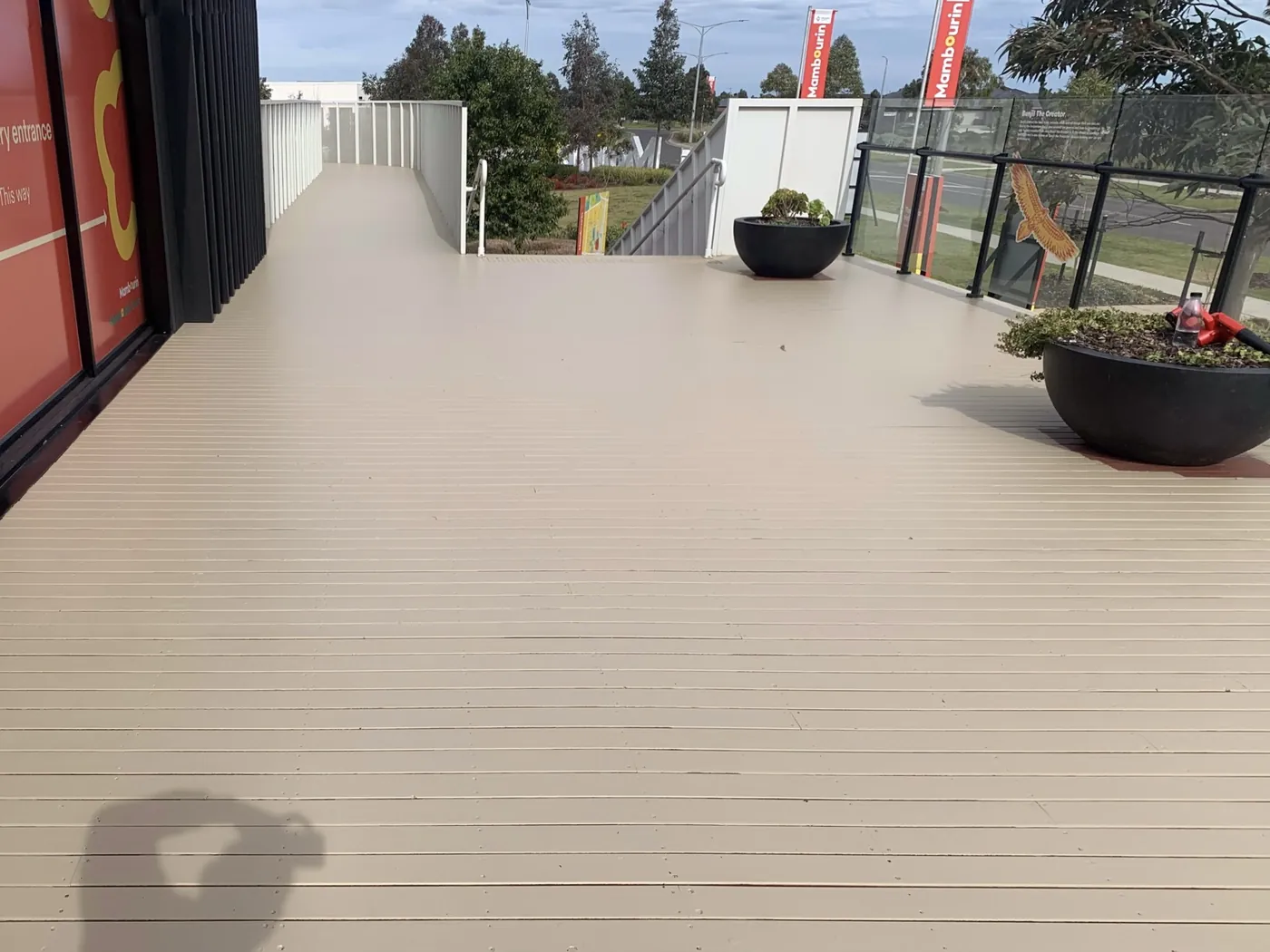 Same terrace after, recoated in a warm sand tone, Point Cook