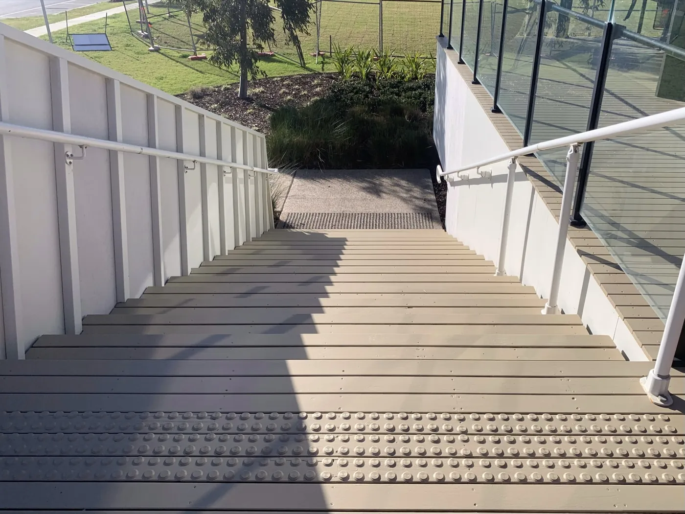 Same stairs after, evenly coated with clean tactile indicators, Point Cook