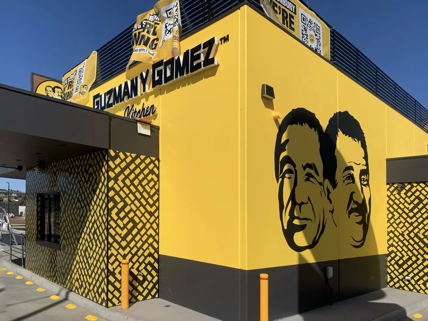 Guzman Y Gomez corner with signage and patterned feature panels, Sunbury