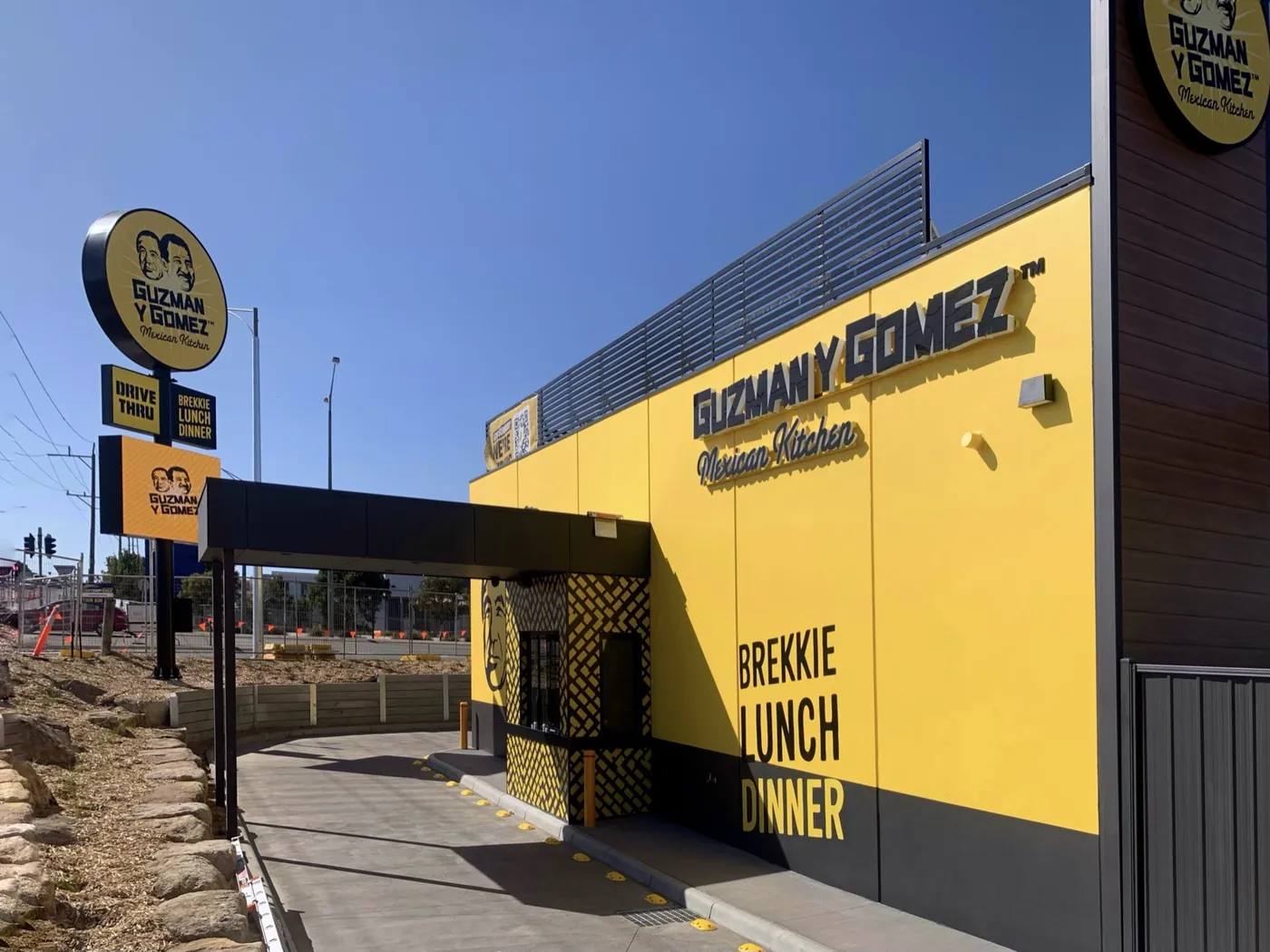 Guzman Y Gomez drive-through entrance and pole signage, Sunbury
