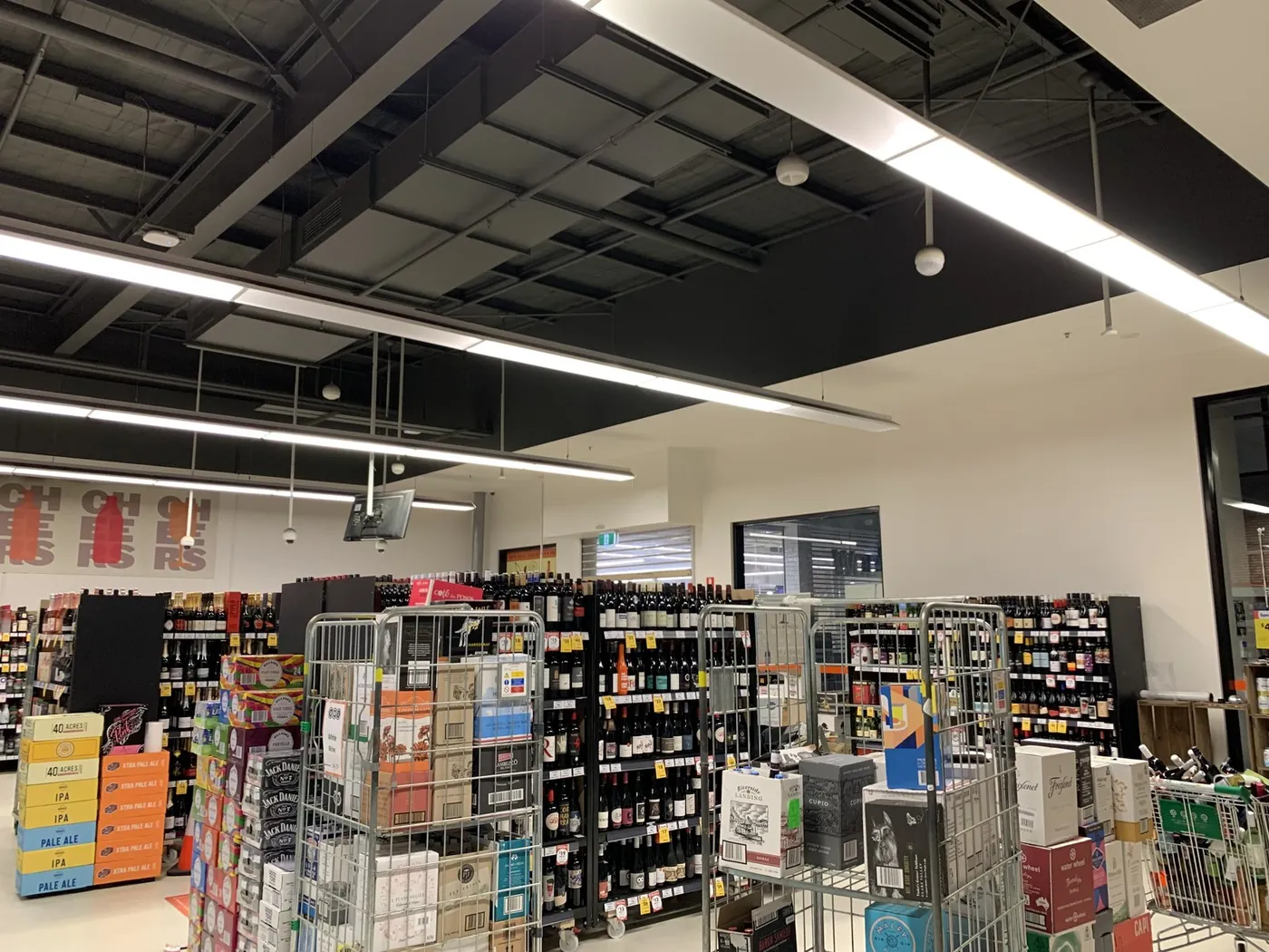 Same view after, ceiling structure sprayed black with the shop back in trade, Ballarat