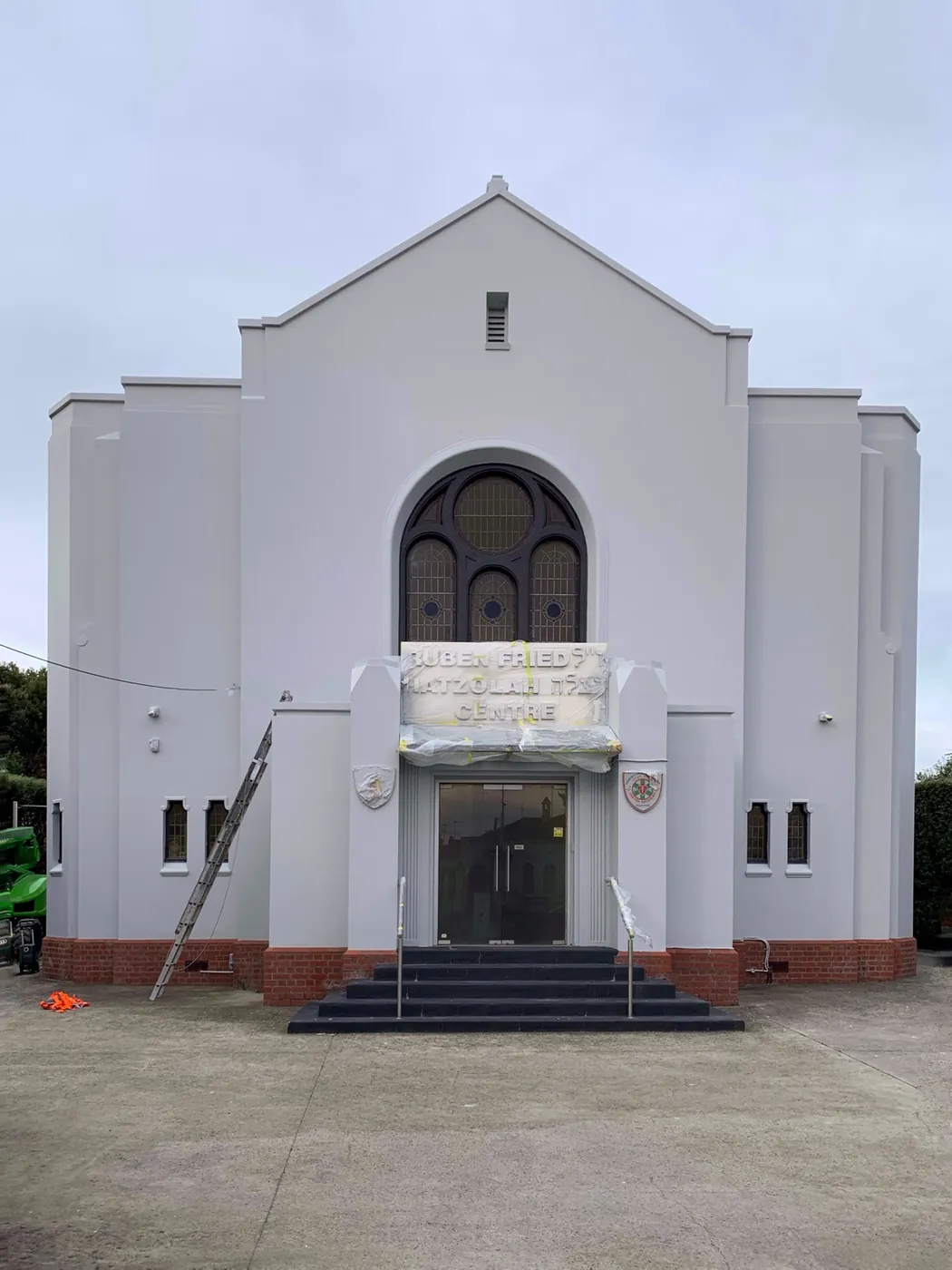Heritage community centre in Caulfield after a full exterior repaint in soft pale grey