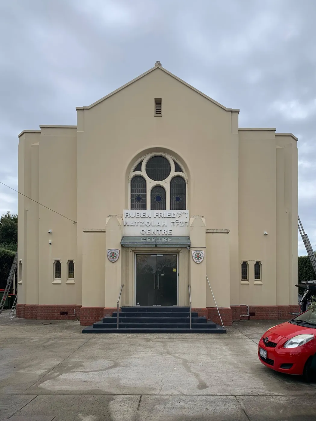 Synagogue front facade before, tired cream render, Caulfield