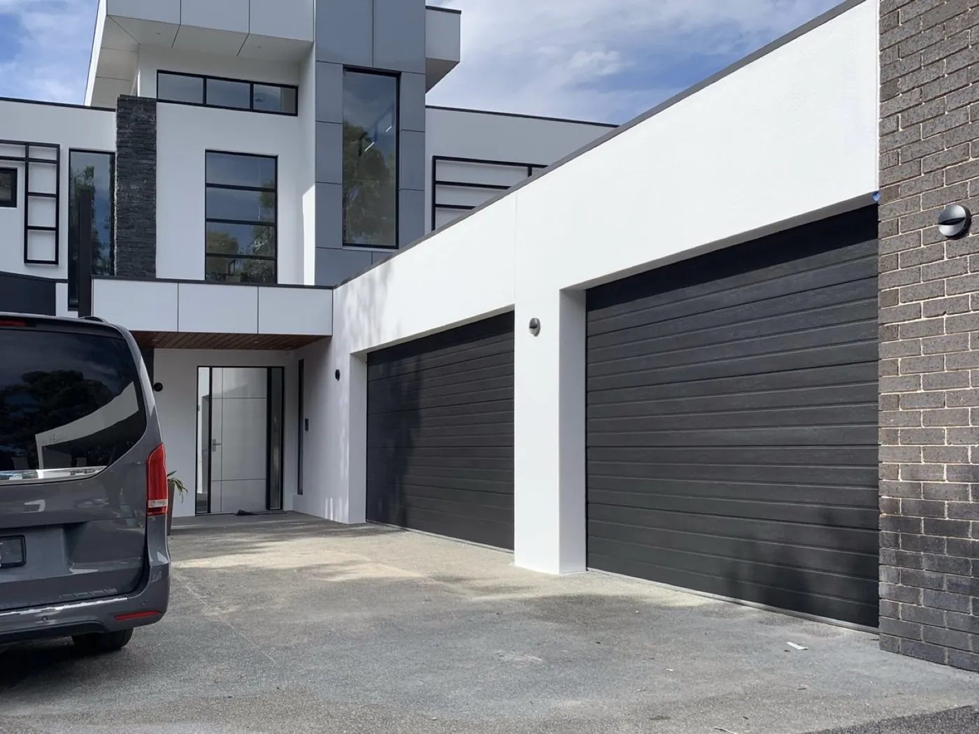 Same garage door finished in charcoal, Donvale