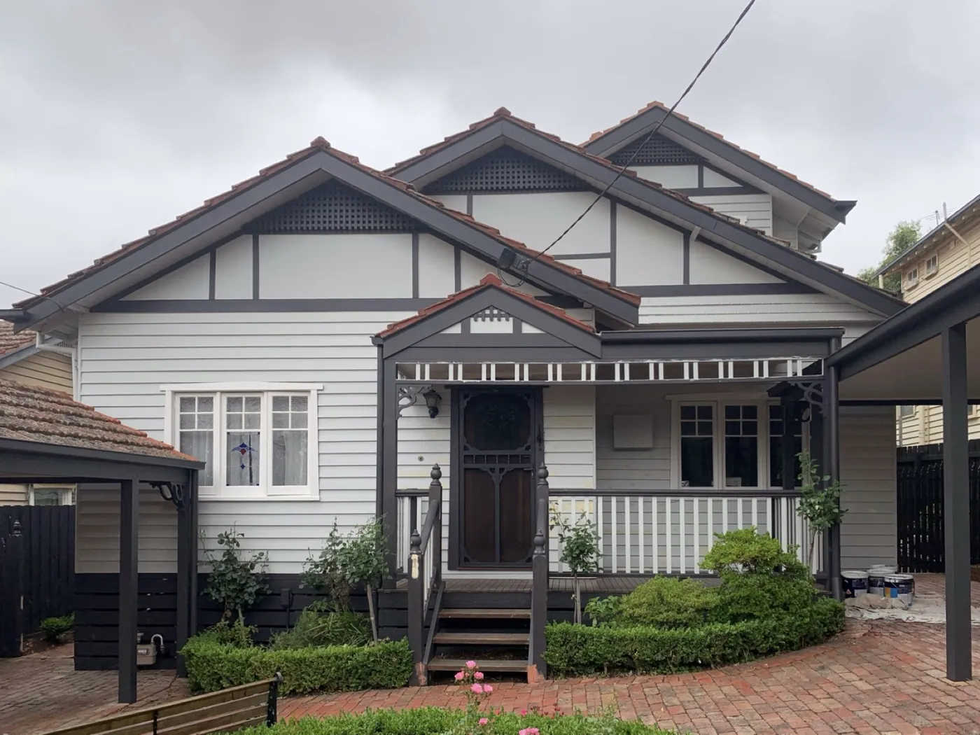 Weatherboard bungalow front after, grey with charcoal trim, Glen Iris