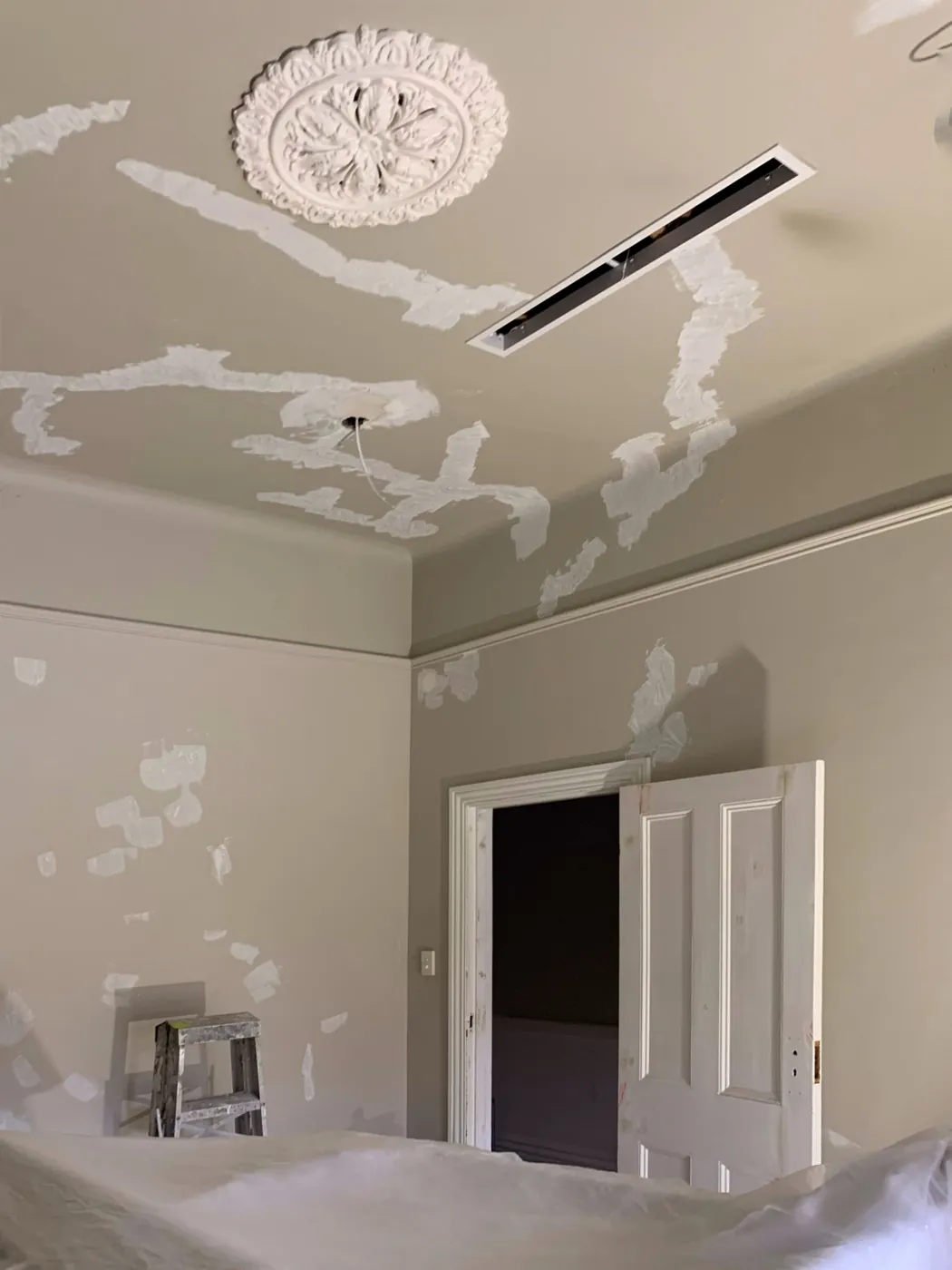 Heritage ceiling rose surrounded by filler patches, cracks made good before painting, Armadale