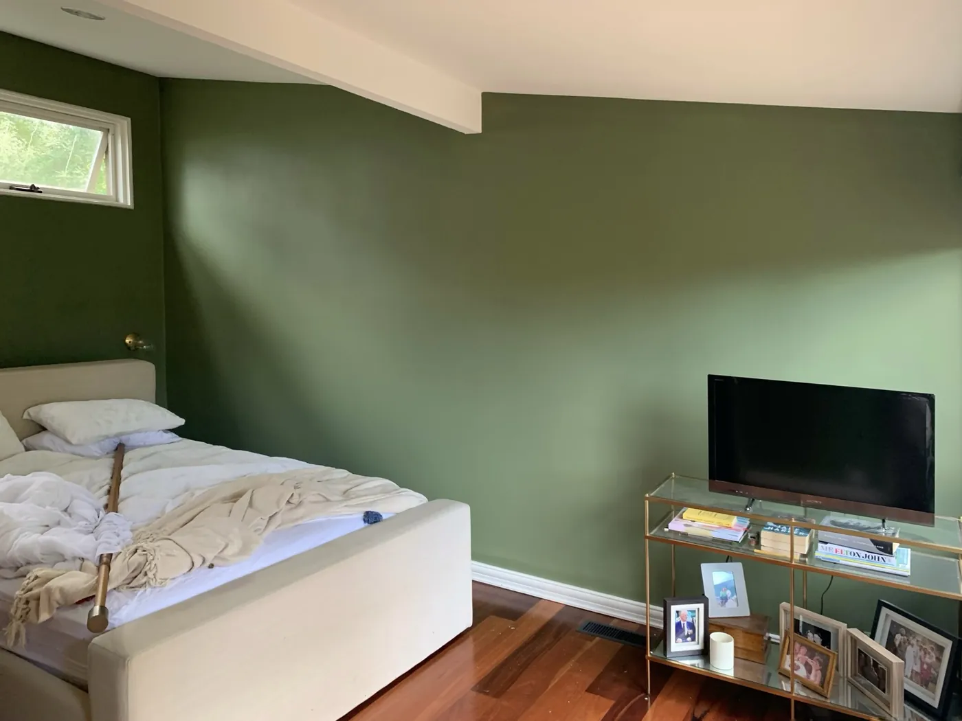 Same bedroom in deep olive with the raked ceiling and beam left white, Ferntree Gully