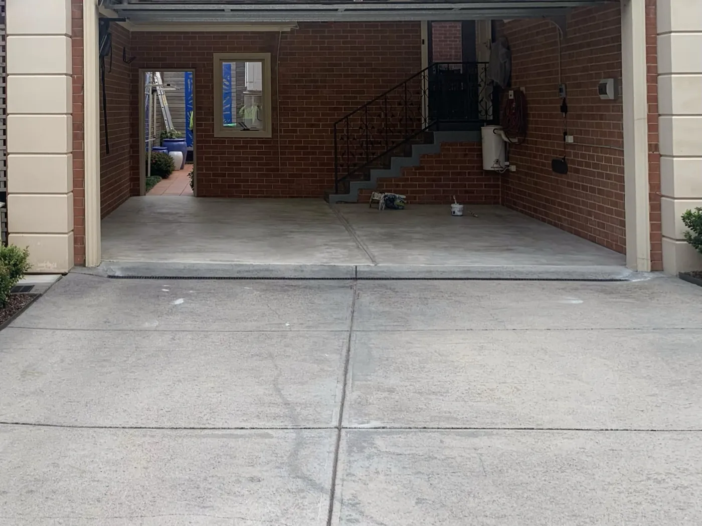 Garage and driveway before, weathered concrete seen from the street, Balwyn North