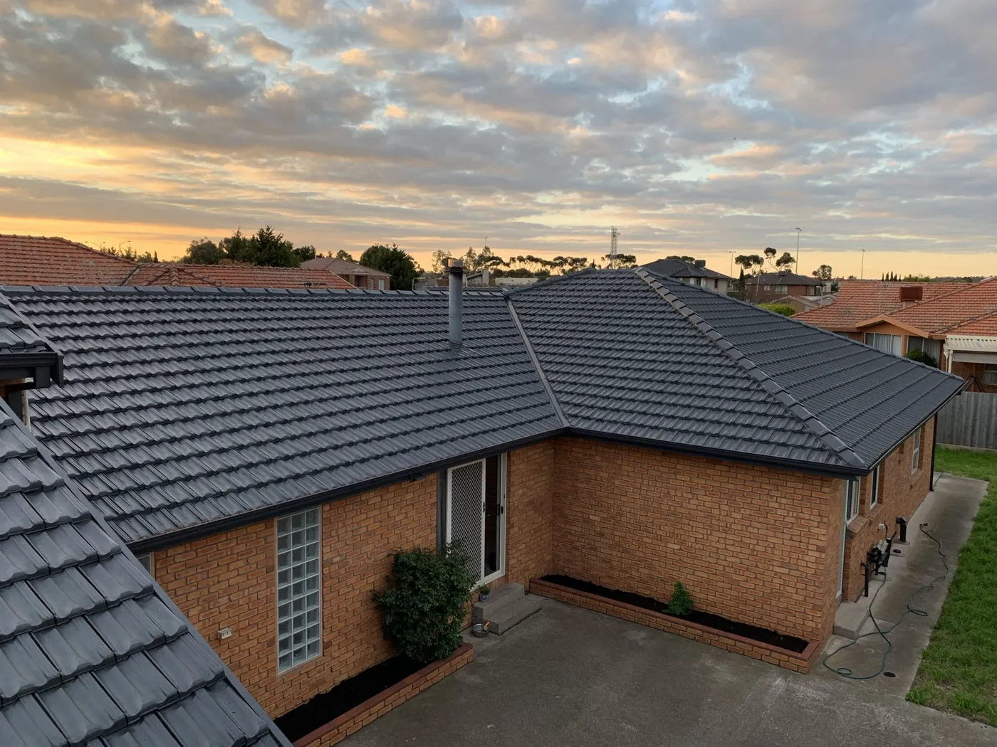 Same roof after repainting in charcoal, Greendale